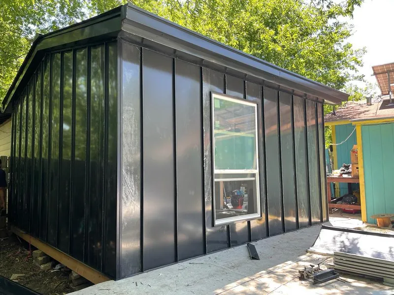 Black standing seam metal wall panels for Metal Roof Installation in Saks